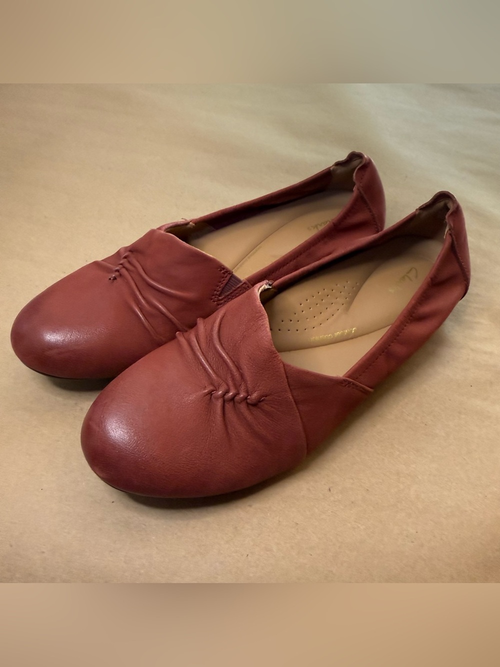 Clarks Women's Slip-On Flats in Brick Red